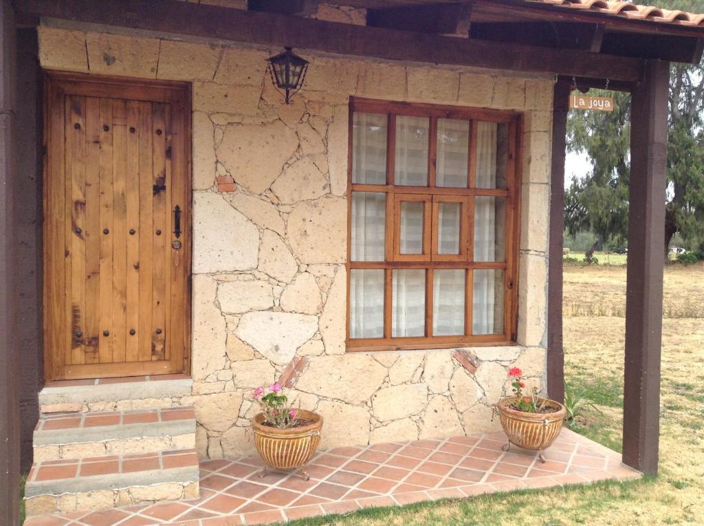 הוילה הואסקה דה אוקמפו Valle Escondido Cabanas חדר תמונה